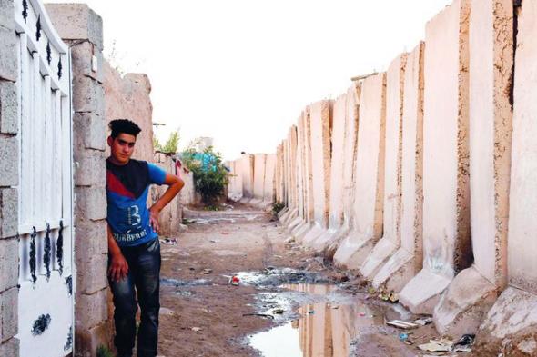 سور من زمن النزاع الطائفي لايزال يحاصر مدينة سامراء العراقية