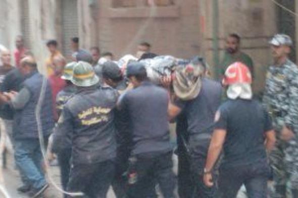 إخراج جثمان شاب من تحت أنقاض عقار منهار بالإسكندرية