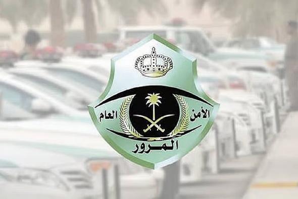 المرور:
تعلق
سائق
الدراجة
الآلية
بمركبة
أخرى
مخالفة
مرورية