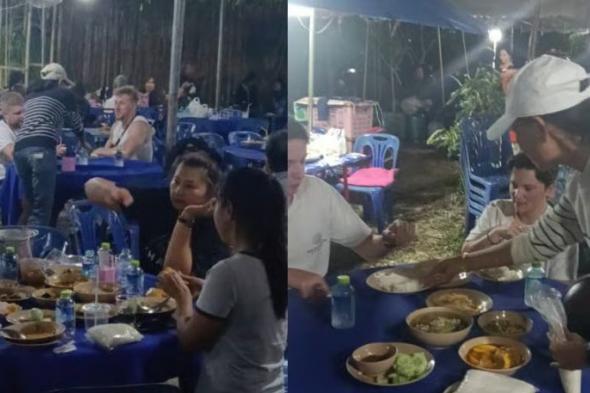 سياح أوربيون يقتحمون طعام الجنازات في تايلاند معتقدين أنه بوفيه مفتوح